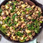 This Whole30 sausage and cranberry breakfast skillet is a quick and easy, family friendly, egg-free breakfast. A Paleo, gluten-free recipe that’s filling, full of flavor, and perfect for meal prep. One pan meals are the way to go for fast meal prepping, and this Whole30 breakfast is the perfect addition to your menu for during the week. #whole30eggfree #eggfreebreakfast #whole30breakfastskillet #whole30breakfast #paleobreakfast