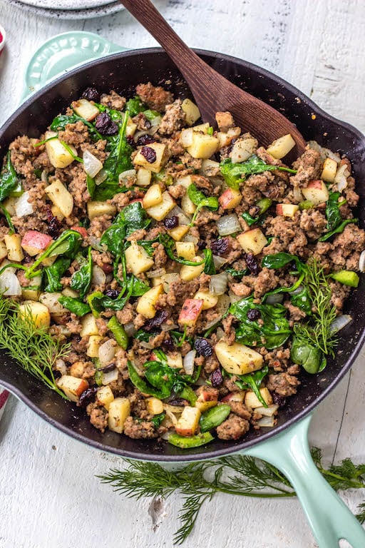 This Whole30 sausage and cranberry breakfast skillet is a quick and easy, family friendly, egg-free breakfast. A Paleo, gluten-free recipe that’s filling, full of flavor, and perfect for meal prep. One pan meals are the way to go for fast meal prepping, and this Whole30 breakfast is the perfect addition to your menu for during the week. #whole30eggfree #eggfreebreakfast #whole30breakfastskillet #whole30breakfast #paleobreakfast