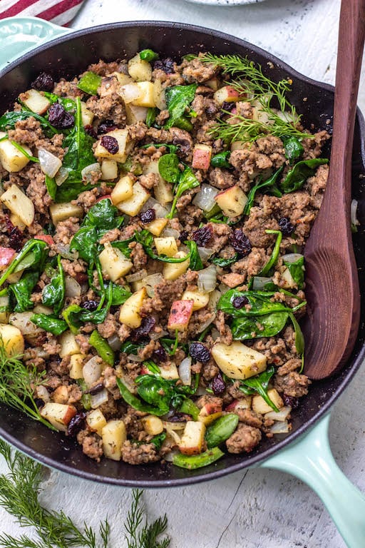 This Whole30 sausage and cranberry breakfast skillet is a quick and easy, family friendly, egg-free breakfast. A Paleo, gluten-free recipe that’s filling, full of flavor, and perfect for meal prep. One pan meals are the way to go for fast meal prepping, and this Whole30 breakfast is the perfect addition to your menu for during the week. #whole30eggfree #eggfreebreakfast #whole30breakfastskillet #whole30breakfast #paleobreakfast