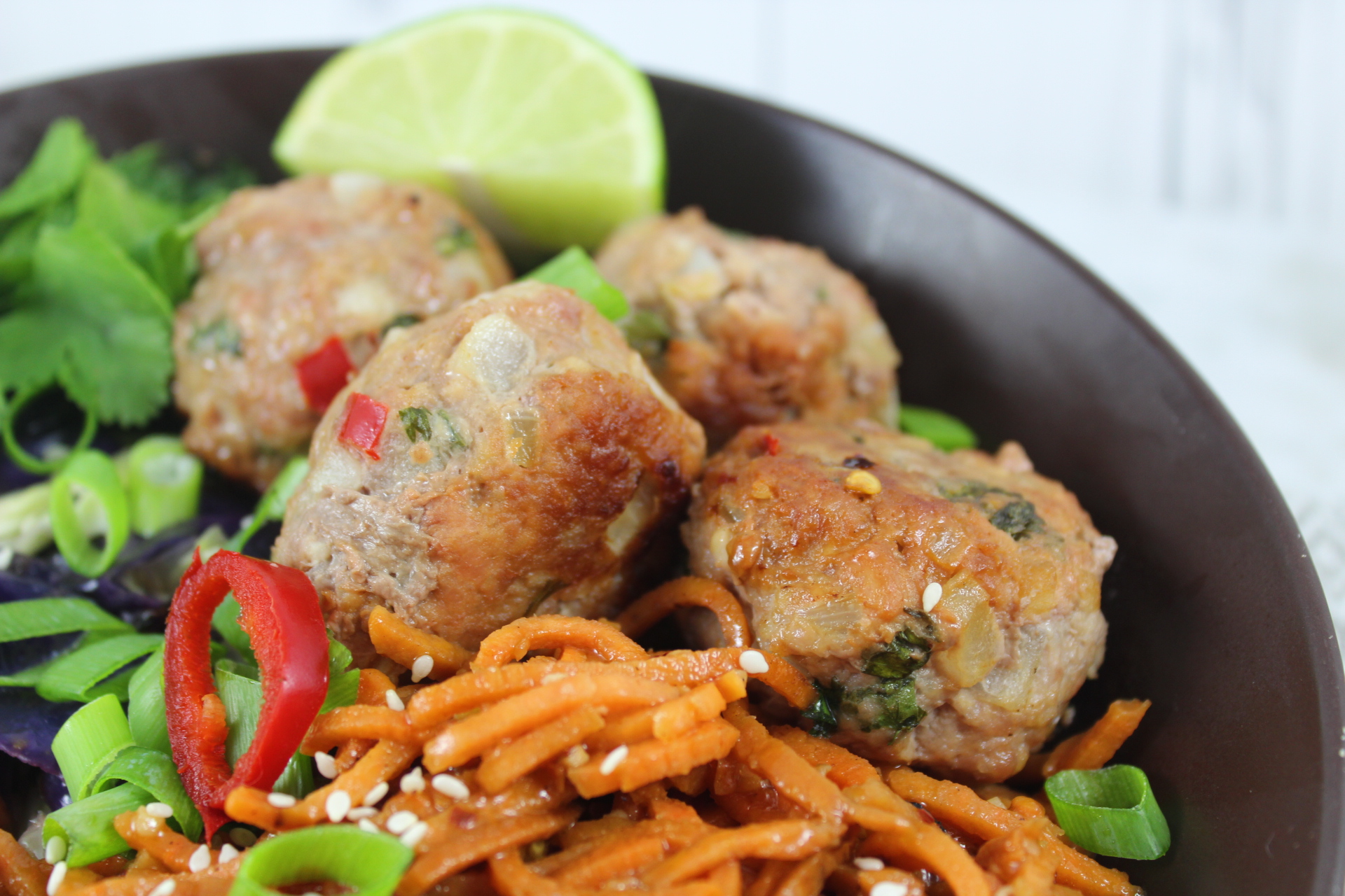 paleo spicy pork meatballs and sesame noodles