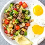 This is the easiest Whole30 and egg free breakfast! Mediterranean breakfast hash, or breakfast skillet, is a one pan recipe that comes together in under 30 minutes. It's full of hearty vegetables like potatoes, onions and broccoli, and seasoned to perfection. It's a perfect paleo or gluten-free meal prep recipe that reheats well, or family friendly option for a quick morning meal. #whole30breakfast #whole30eggfree #breakfastskillet #breakfasthash #glutenfree