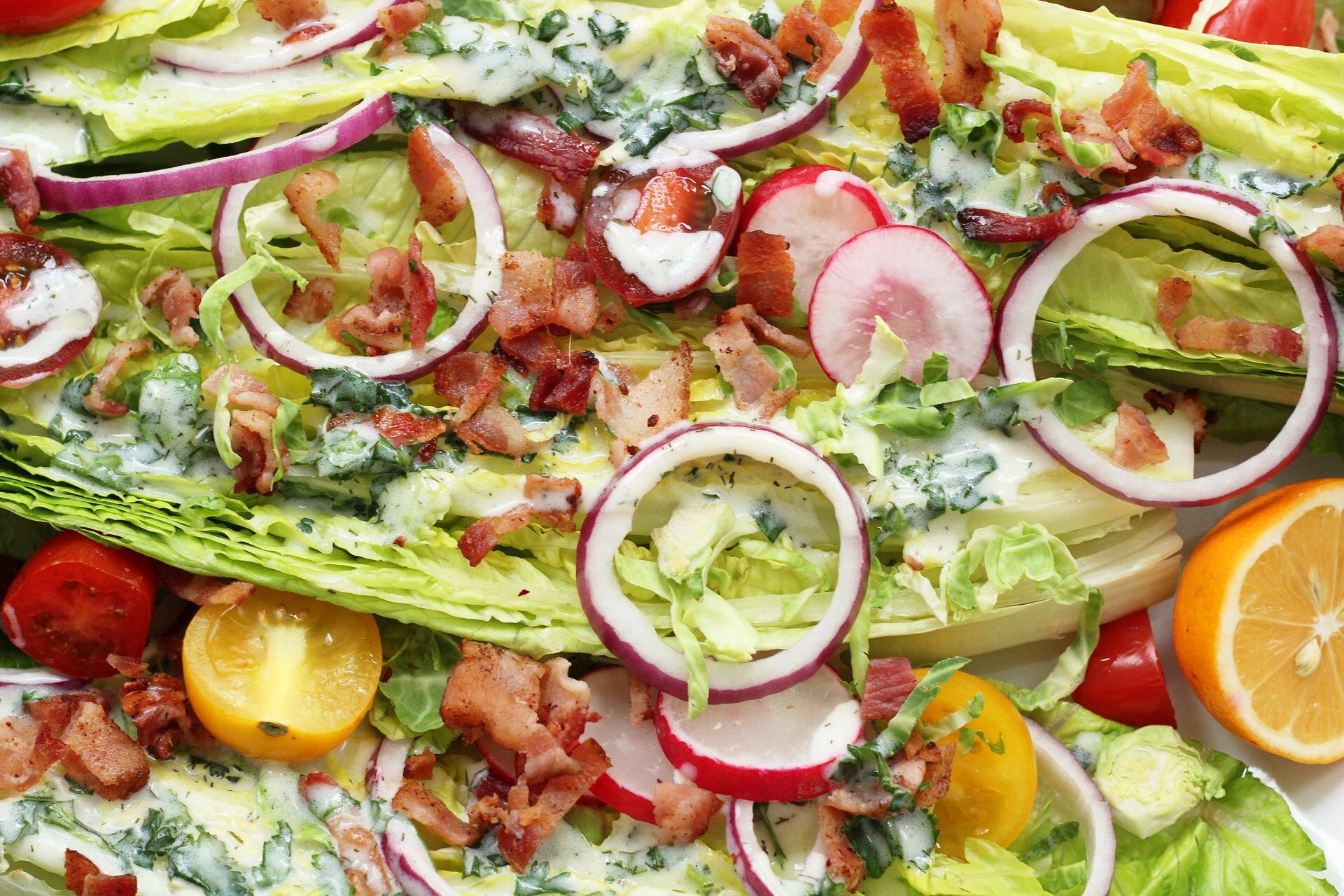 Easy low carb and paleo romaine wedge salad with a creamy herb Whole30 dressing! #paleodressing #paleowedgesalad #whole30saladdressing #lowcarb #whole30dressing