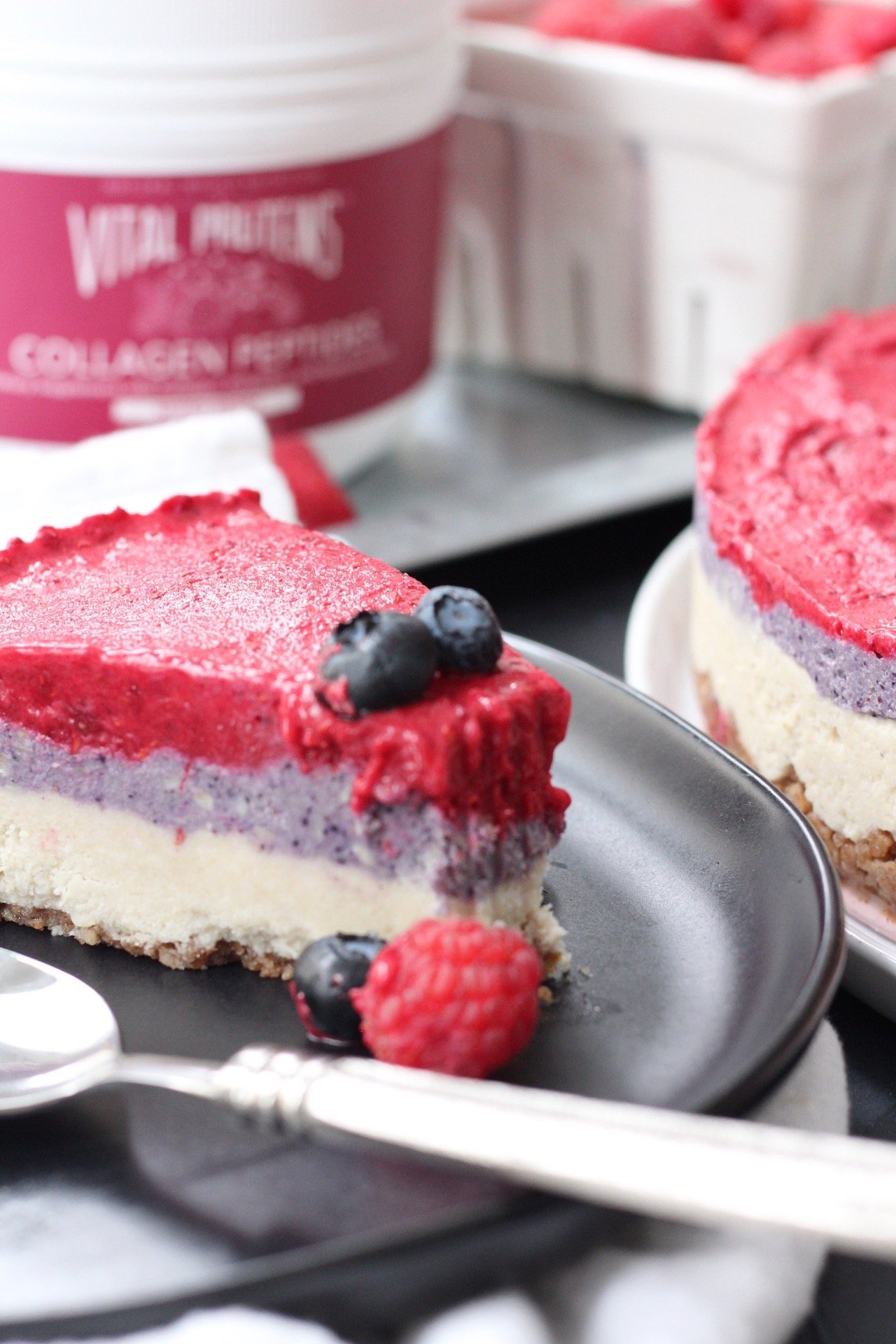 Easy paleo cheesecake is a fun recipe to make for any special occasion or just for dessert! With colorful dairy free cheesecake layers and a simple no bake crust, you'll feel like you're indulging when you're eating totally healthy! #paleocheesecake #dairyfreecheesecake #nobakecheesecake #vegancheesecake
