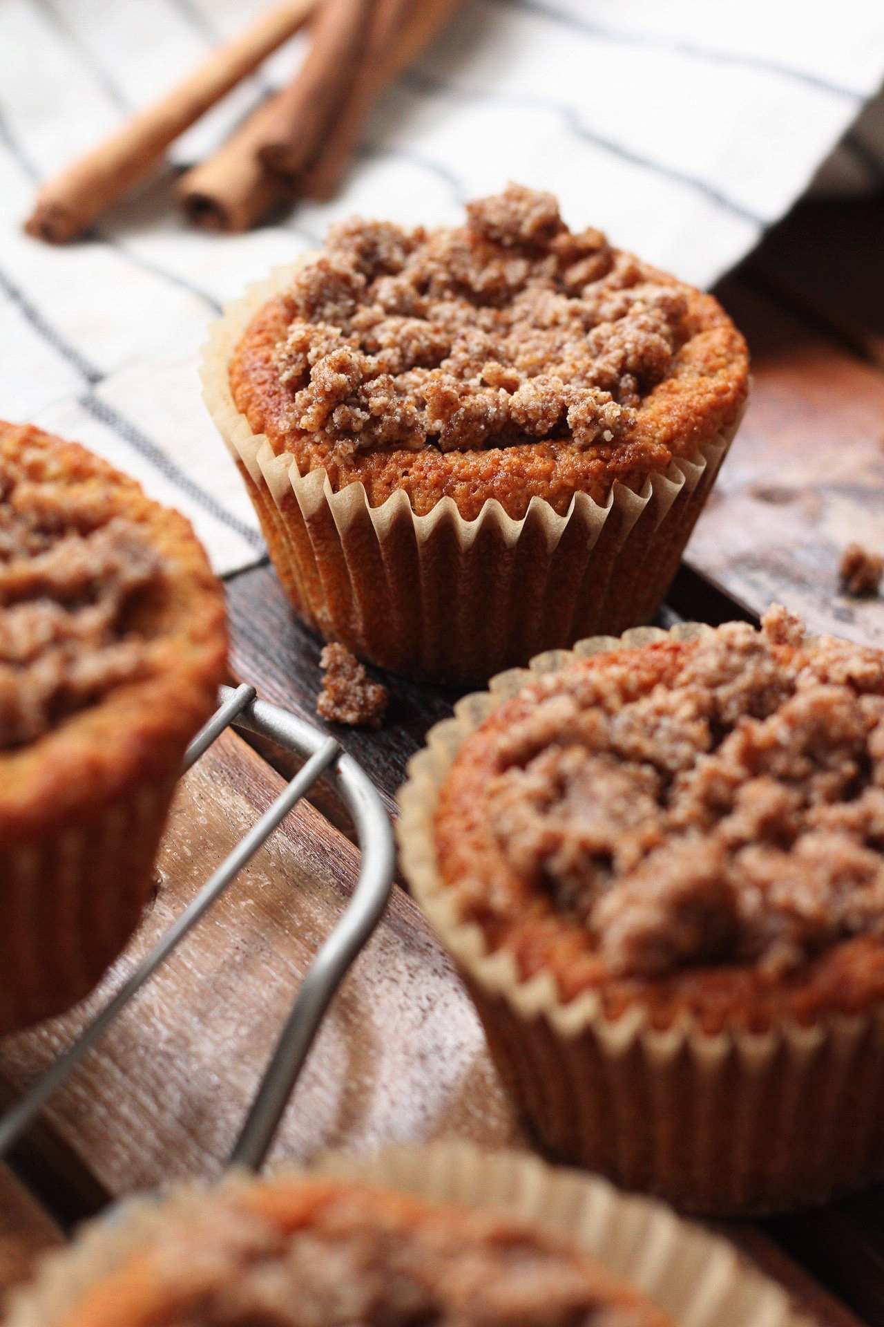 These grain free Paleo Cinnamon Muffins are a 25 minute, delicious, family friendly recipe. This easy paleo cinnamon muffin recipe makes it easy to make healthier choices, because they're so dang good! #grainfreecinnamonmuffins #paleomuffins #paleocinnamonmuffins #grainfreemuffins #paleomuffinrecipes