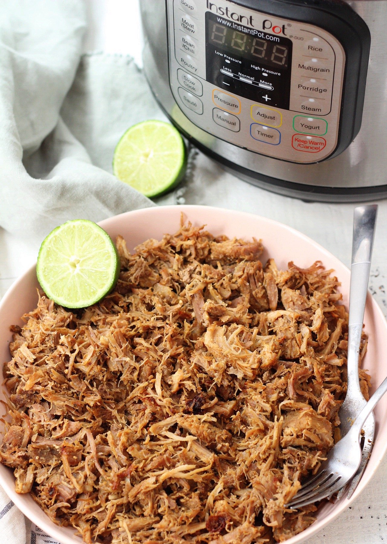 Easy Whole30 and Paleo instant pot pork carnitas only take a few simple ingredients and less than an hours time to cook perfectly! This is a great whole30 pork recipe for meal prep, or as a family friendly recipes for tacos or burritos! #paleocarnitas #whole30instantpot #whole30carnitas
