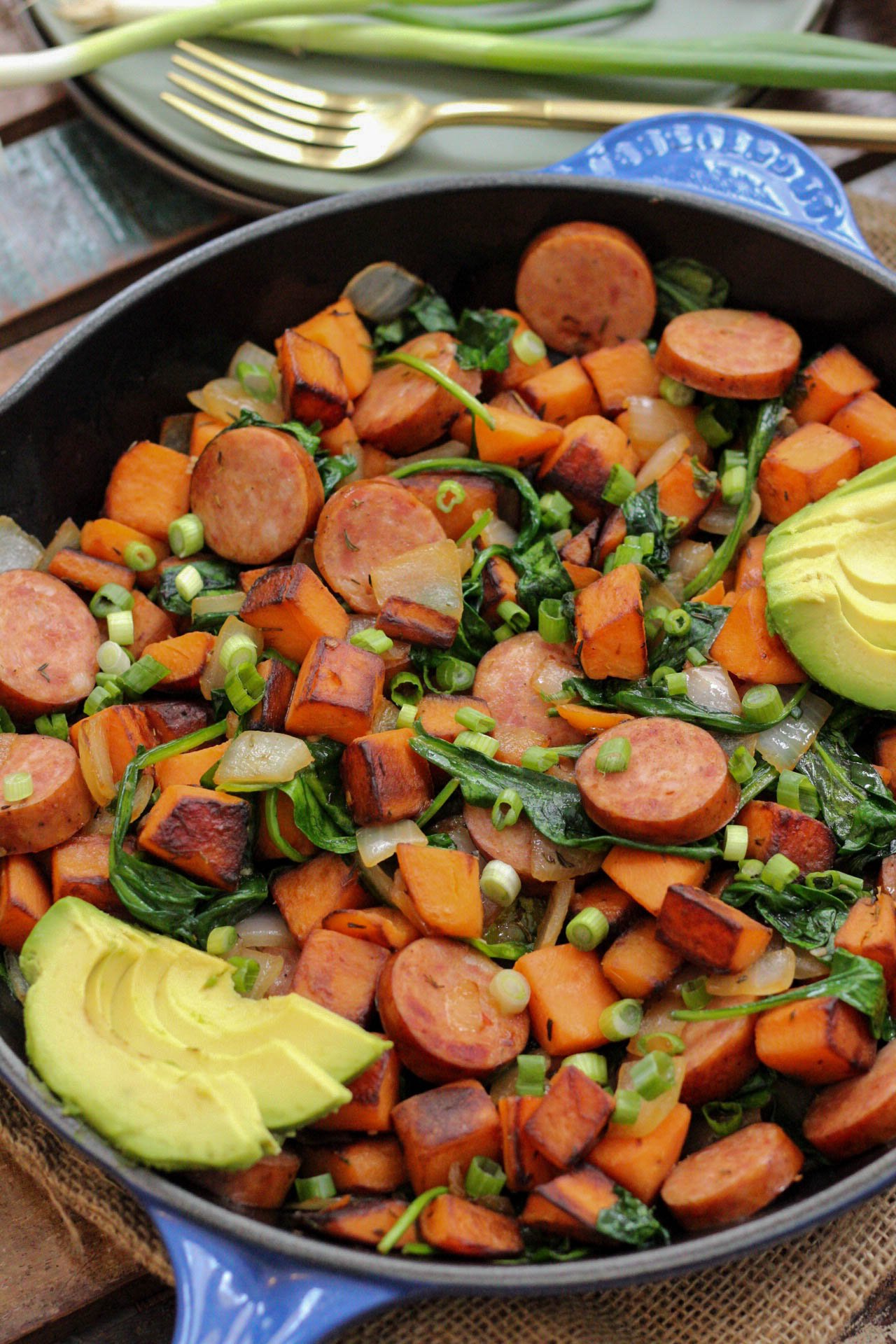 An easy Paleo egg-free breakfast recipe is always a simple go to meal. This skillet is full of healthy vegetables, flavorful spices and sausage! This egg-free breakfast is also Whole30 for when you're sick of eggs or want to meal prep breakfast! #eggfreebreakfast #paleobreakfast #whole30breakfast #breakfastskillet #breakfasthash