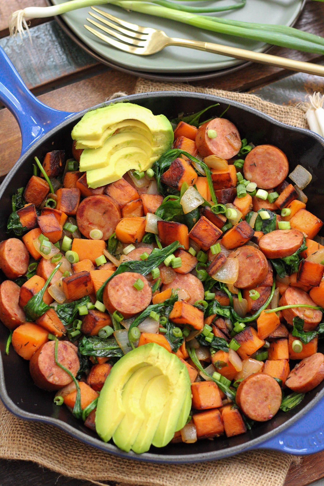 An easy Paleo egg-free breakfast recipe is always a simple go to meal. This skillet is full of healthy vegetables, flavorful spices and sausage! This egg-free breakfast is also Whole30 for when you're sick of eggs or want to meal prep breakfast! #eggfreebreakfast #paleobreakfast #whole30breakfast #breakfastskillet #breakfasthash