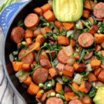 An easy Paleo egg-free breakfast recipe is always a simple go to meal. This skillet is full of healthy vegetables, flavorful spices and sausage! This egg-free breakfast is also Whole30 for when you're sick of eggs or want to meal prep breakfast! #eggfreebreakfast #paleobreakfast #whole30breakfast #breakfastskillet #breakfasthash