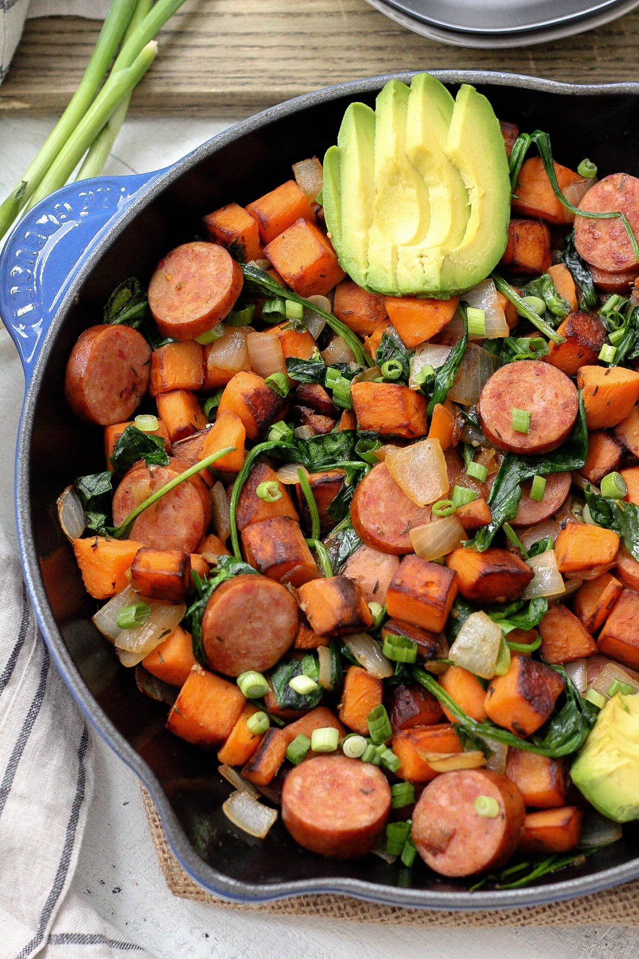 An easy Paleo egg-free breakfast recipe is always a simple go to meal. This skillet is full of healthy vegetables, flavorful spices and sausage! This egg-free breakfast is also Whole30 for when you're sick of eggs or want to meal prep breakfast! #eggfreebreakfast #paleobreakfast #whole30breakfast #breakfastskillet #breakfasthash