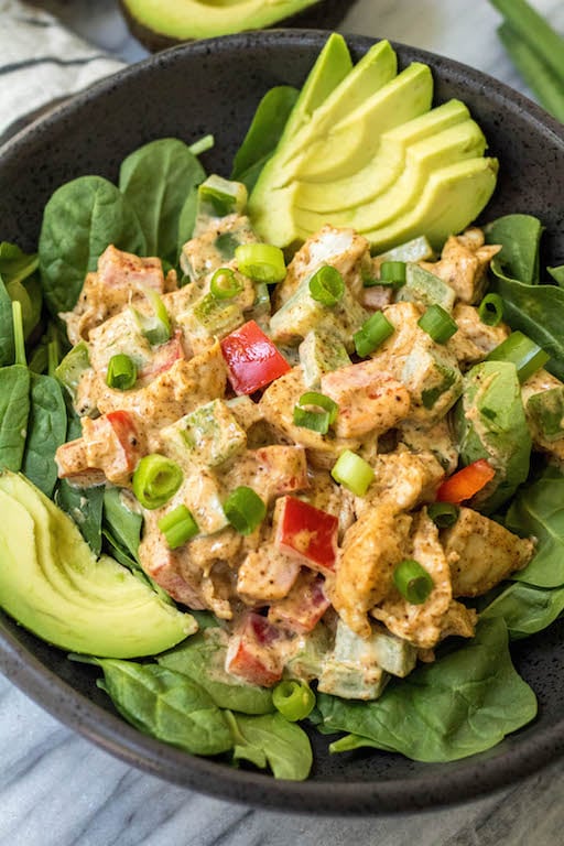 This easy taco chicken salad is a family friendly paleo recipe that only takes 15 minutes to whip together. No cooking needed! It's a great Whole30 salad for meal prep or Whole30 side dish for any event! #paleochickensalad #whole30chickensalad #whole30side