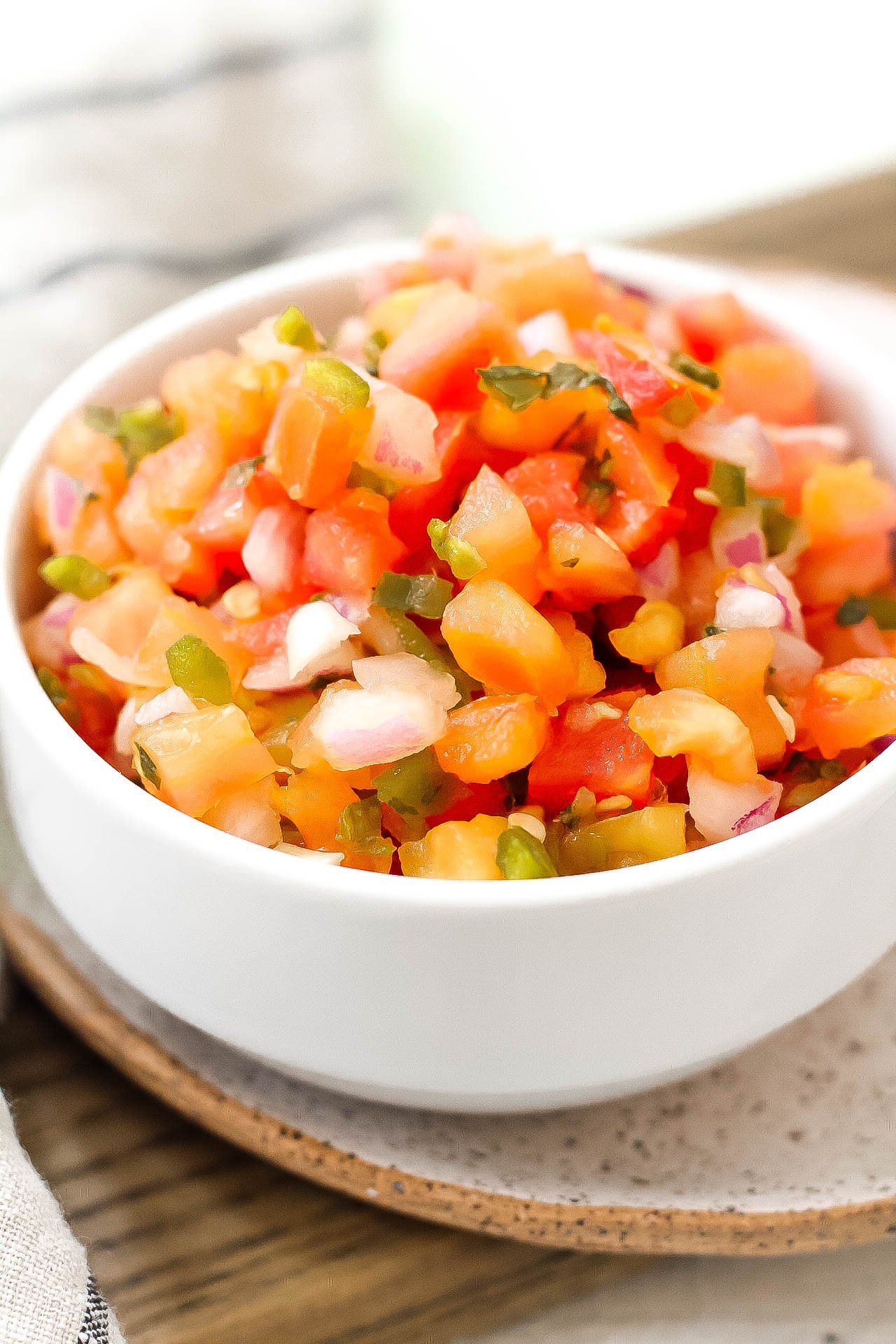 This easy Pico de Gallo is a fresh Whole30 and Paleo salsa option. It takes 10 minutes to have a delicious homemade pico for tacos, tortilla chips, salads, or fajitas! This Pico de Gallo is made with only a few simple ingredients like tomatoes, cilantro, onions, and lime juice! #whole30salsa #whole30pico #paleosalsa #picodegallo