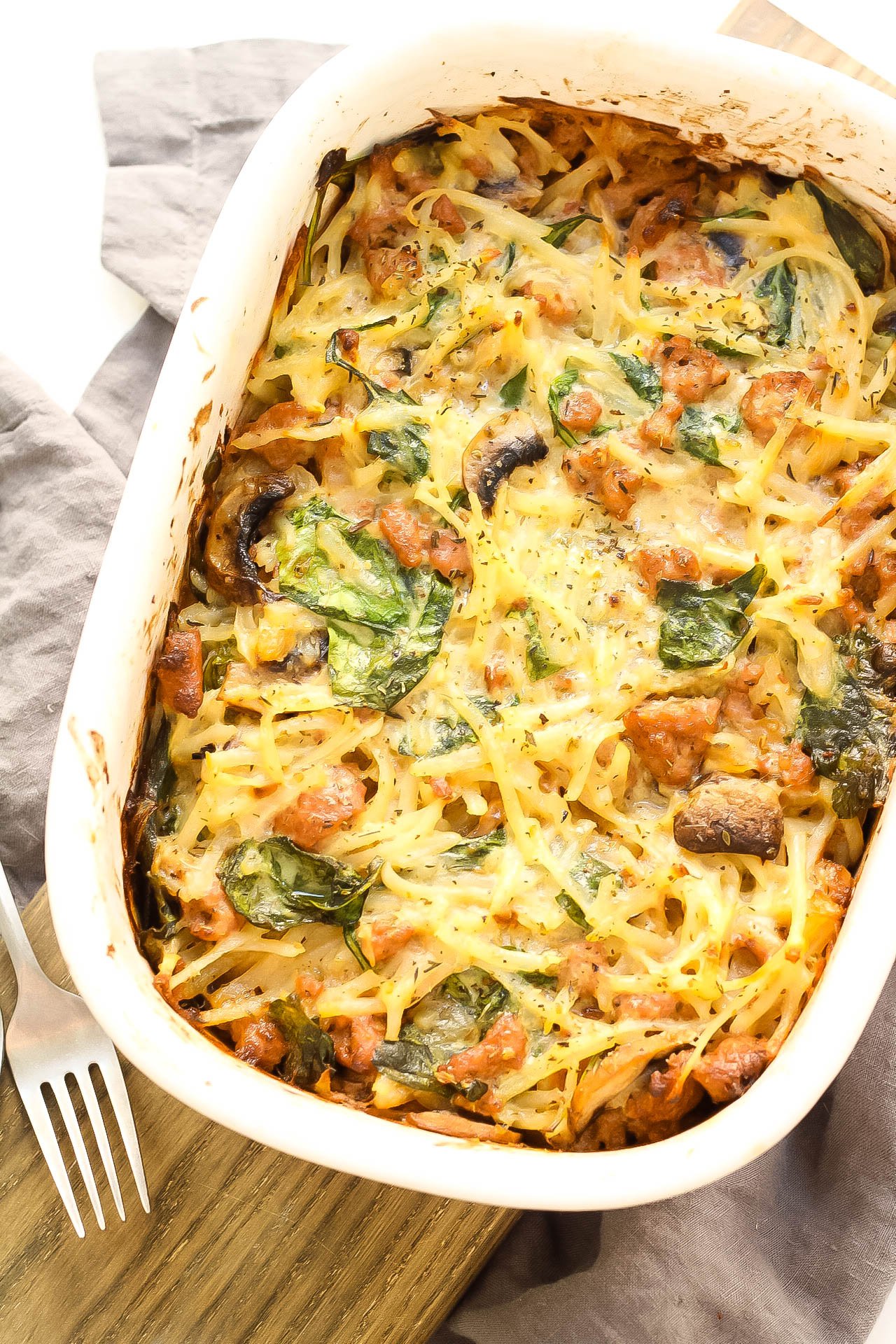 This creamy Whole30 casserole is the perfect easy and family friendly dinner. It's with sausage and potatoes in under an hour and is a creamy, comforting Paleo or Whole30 recipe. It would be great for meal prep, and I think the leftovers are almost more delicious! #whole30casserole #paleocasserole #whole30recipes #paleorecipes