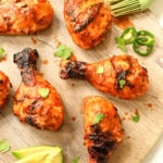 These fiesta Whole30 chicken drumsticks are marinaded in the best ever homemade Paleo and Whole30 taco sauce. The homemade taco sauce is only a few simple ingredients, and when you throw the chicken drumsticks on the grill, you have an easy dinner or protein for meal prep in under 30 minutes! Even if you want to use the oven baked method, these are the best tasting marinaded drumsticks! #whole30chickendrumsticks #homemadetacosauce #paleochickenrecipes #whole30tacosauce