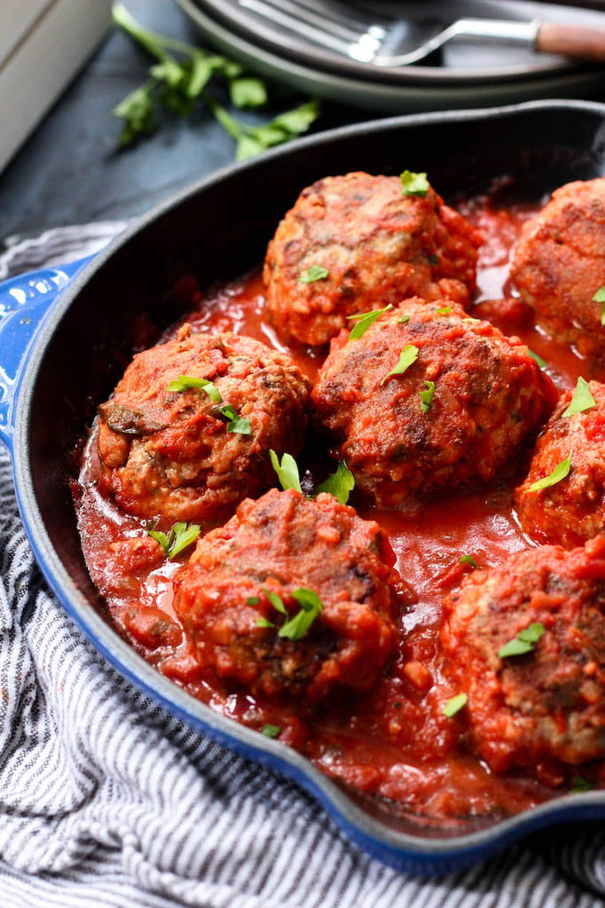 These Whole30 skillet meatballs are cooked up in one pan on the stovetop with the marinara, no oven needed! It's a quick and easy weeknight dinner or meal prep recipe that covers all your dietary bases, Whole30, Paleo, low carb, dairy-free, you name it. Just some good, flavorful Italian style meatballs. #whole30meatballs #whole30onepan #paleomeatballs