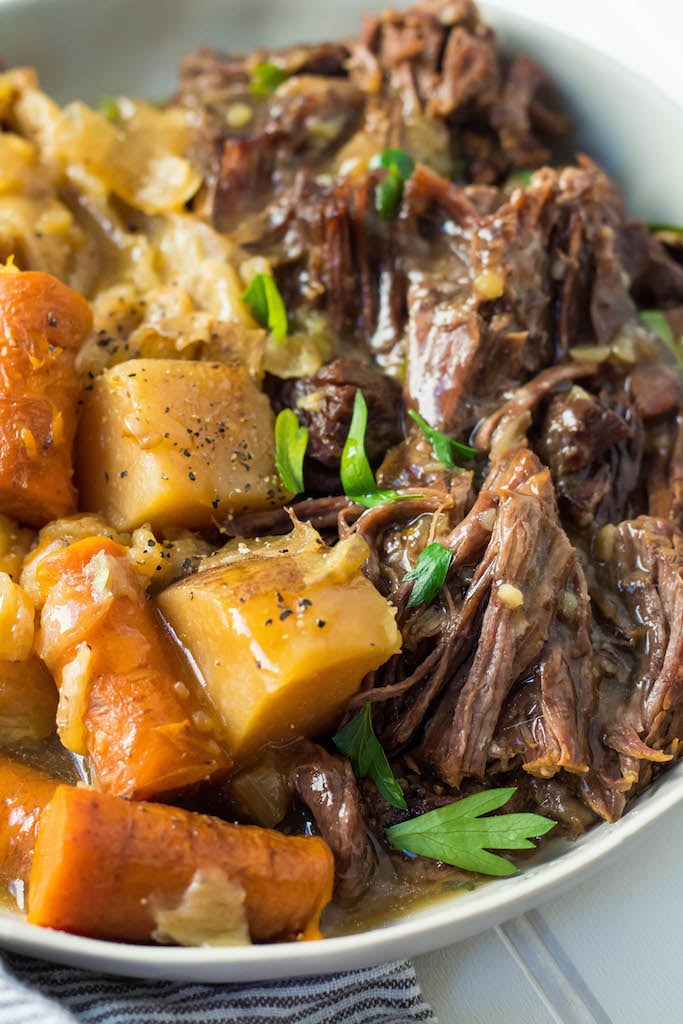 This classic Whole30 instant pot pot roast recipe is just the way my Nana makes it. Except of course in the instant pot, and totally Whole30 and Paleo! It's got that gravy we all know and love, hearty veggies and with a few buttons on your instant pot, you've got an easy Whole30 dinner! It also makes a great meal prep recipe being it makes enough to feed an army! #whole30recipes #whole30instantpot #whole30potroast #instantpotpotroast