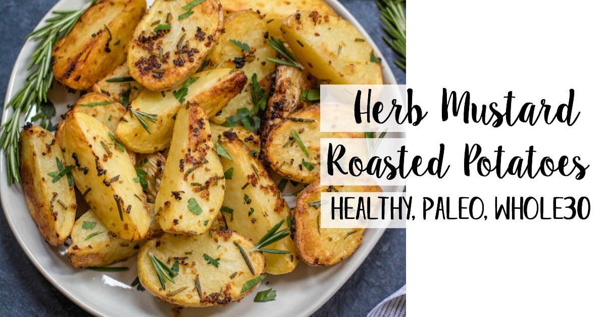 These garlicky, herb and mustard roasted potatoes are baked to crispy perfection. This Whole30 and paleo side dish takes just minutes to throw together for an easy weeknight dinner and are delicious enough to be a crowd pleaser at any holiday meal. The potato side dish requires only a handful of simple ingredients, 30 minutes in the oven and reheats great for leftovers or breakfast #whole30sidedish #whole30potatoes #paleosidedish #mustardpotatoes