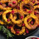 This roasted delicata squash, sweet potato and cranberry recipe is an easy, healthy side dish that has all of the best seasonal fall flavors. Made with real ingredients, it's a simple gluten-free, paleo and Whole30 Thanksgiving or holiday vegetable dish that makes a beautiful statement on the table. #whole30sidedish #delicatasquash #whole30vegetables #whole30holidayrecipes #holidayvegetables