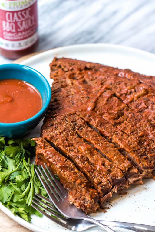 This easy BBQ beef brisket is so simple thanks to help from the instant pot, and it's perfect for an easy weeknight dinner. With the BBQ sauce and only a handful of other ingredients, the Whole30 and Paleo brisket has a classic smoky flavor that the whole family will love. #whole30beef #paleobeef #instantpotbeef #whole30instantpot