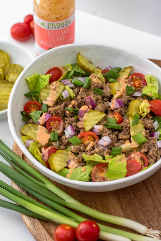 This chopped big mac salad is such an easy, delicious and quick lunch or dinner to whip up on a weekday or to prepare for meal prep. It's full of flavor but still a low carb or keto, Whole30 and Paleo salad recipe. Plus the only thing you have to really even cook is the beef! Just a little chopping and you've got your healthy salad ready to go. #whole30recipes #paleorecipes #bigmacsalad #ketorecipes