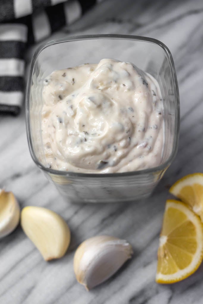 This homemade Whole30 tartar sauce is easy to make, and a much healthier version made sugar-free and dairy-free. It’s also a keto and paleo homemade sauce option that is a tasty addition to all of your fish recipes! #whole30recipes #whole30tartarsauce #fishrecipes #homemadesauce #paleo #keto