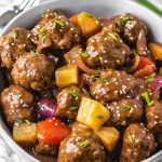 These Paleo and Whole30 sweet and sour meatballs are the perfect weeknight meal or delicious recipe to meal prep. What makes this Asian-inspired recipe even better is that it's done in the slow cooker with little hands-on time. It's a family friendly recipe that everyone is going to love! Plus it's so much healthier than any traditional take out menu item! #whole30recipes #paleorecipes #whole30beef #slowcooker #paleoslowcooker