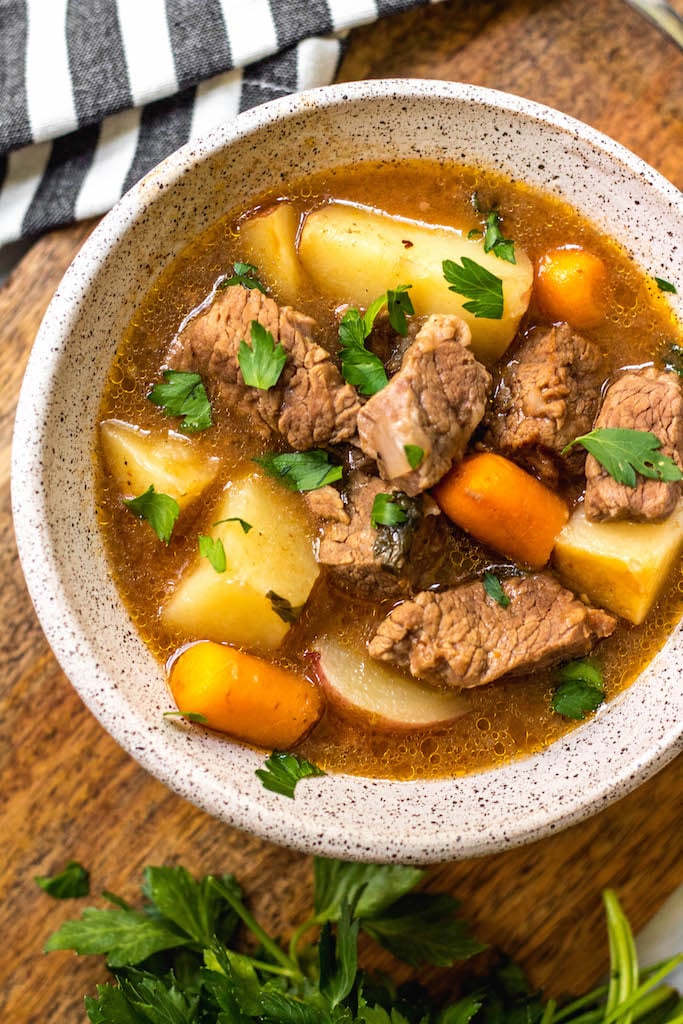 This instant pot beef stew is hearty, comforting, healthy and most importantly, quick and easy! It makes the perfect family friendly weeknight meal or meal prep recipe. The simple ingredients mean that it's Whole30, paleo, dairy and gluten-free. You really can't go wrong with a classic beef stew. #whole30instantpot #whole30recipes #instantpotbeefstew #paleo #paleobeefstew #paleoinstantpot