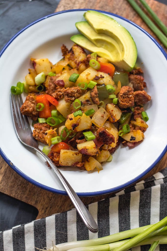 This easy chorizo and vegetable breakfast skillet is a quick egg-free breakfast that's perfect for a Whole30, Paleo or gluten-free meal prep recipe. It's full of hearty veggies and lots of flavor from the herbs and spices in the chorizo, and cooking it in one pan makes clean up simple. It reheats so well, so it's great for breakfast throughout the week! #whole30breakfast #eggfreebreakfast #whole30eggfree #chorizo #breakfastskillet #paleo #glutenfree #onepan #whole30recipes