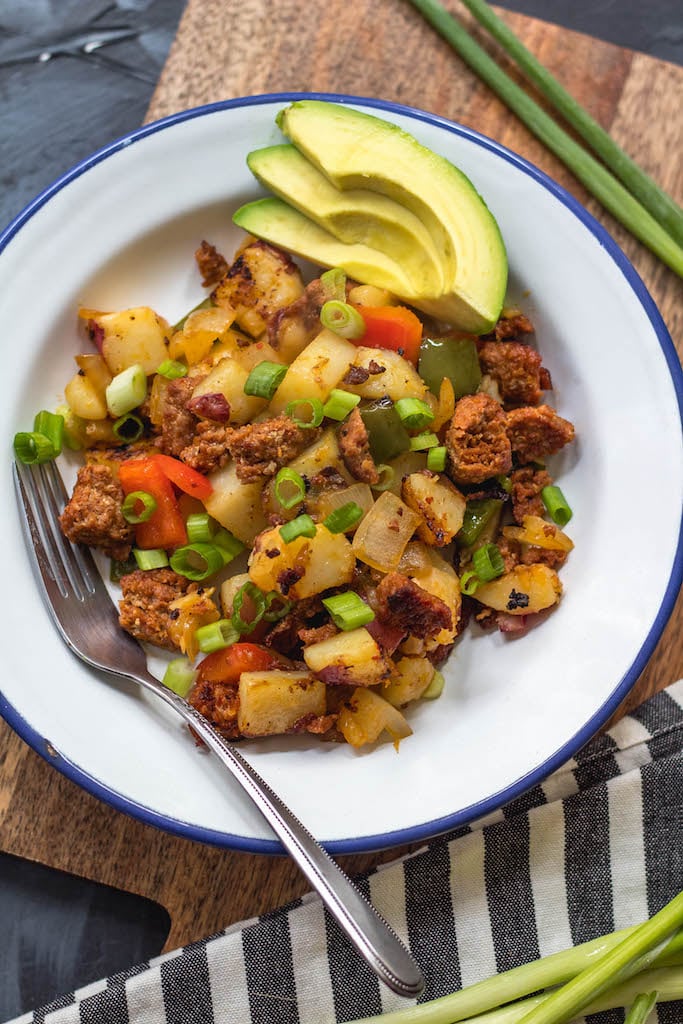 This easy chorizo and vegetable breakfast skillet is a quick egg-free breakfast that's perfect for a Whole30, Paleo or gluten-free meal prep recipe. It's full of hearty veggies and lots of flavor from the herbs and spices in the chorizo, and cooking it in one pan makes clean up simple. It reheats so well, so it's great for breakfast throughout the week! #whole30breakfast #eggfreebreakfast #whole30eggfree #chorizo #breakfastskillet #paleo #glutenfree #onepan #whole30recipes