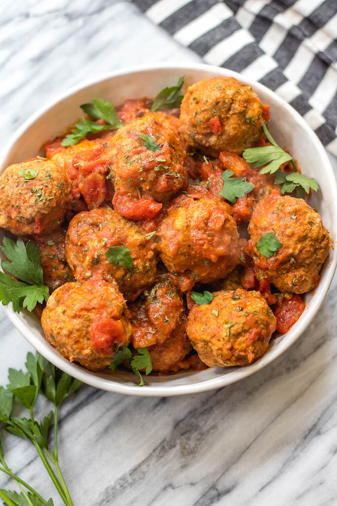 These instant pot beef meatballs are Whole30, paleo, gluten-free and, importantly, so easy to make. The meatballs and marinara take less than 10 minutes cooking time with the pressure cooker and they’re a great family friendly healthy recipe for a weeknight dinner or for a Whole30 meal prep recipe. #whole30beefmeatballs #whole30instantpot #whole30beefrecipes #paleoinstantpot #paleomeatballs #ketoinstantpotrecipes