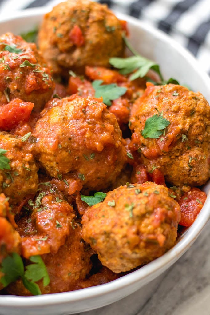 These instant pot beef meatballs are Whole30, paleo, gluten-free and, importantly, so easy to make. The meatballs and marinara take less than 10 minutes cooking time with the pressure cooker and they’re a great family friendly healthy recipe for a weeknight dinner or for a Whole30 meal prep recipe. #whole30beefmeatballs #whole30instantpot #whole30beefrecipes #paleoinstantpot #paleomeatballs #ketoinstantpotrecipes