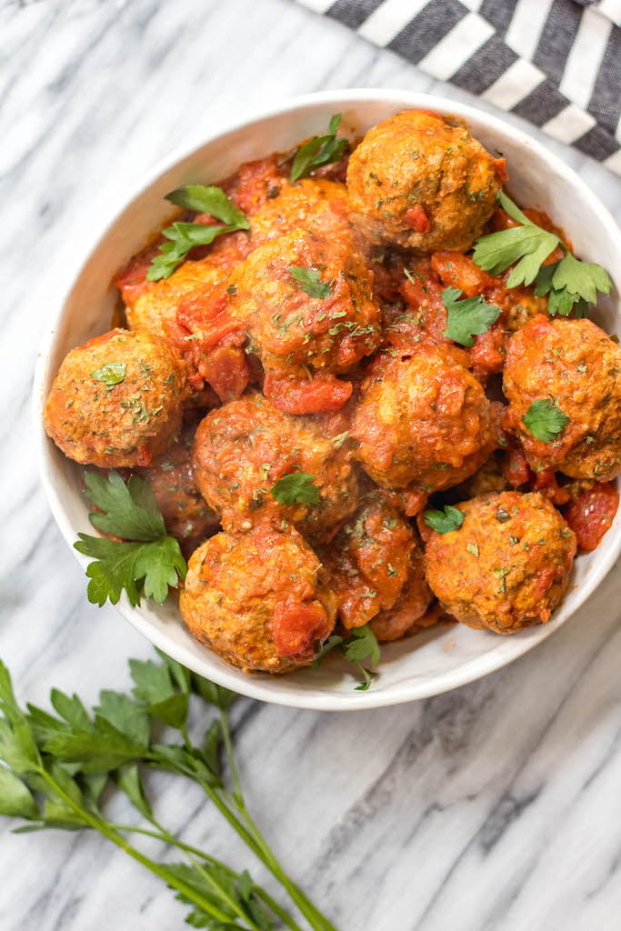 These instant pot beef meatballs are Whole30, paleo, gluten-free and, importantly, so easy to make. The meatballs and marinara take less than 10 minutes cooking time with the pressure cooker and they’re a great family friendly healthy recipe for a weeknight dinner or for a Whole30 meal prep recipe. #whole30beefmeatballs #whole30instantpot #whole30beefrecipes #paleoinstantpot #paleomeatballs #ketoinstantpotrecipes