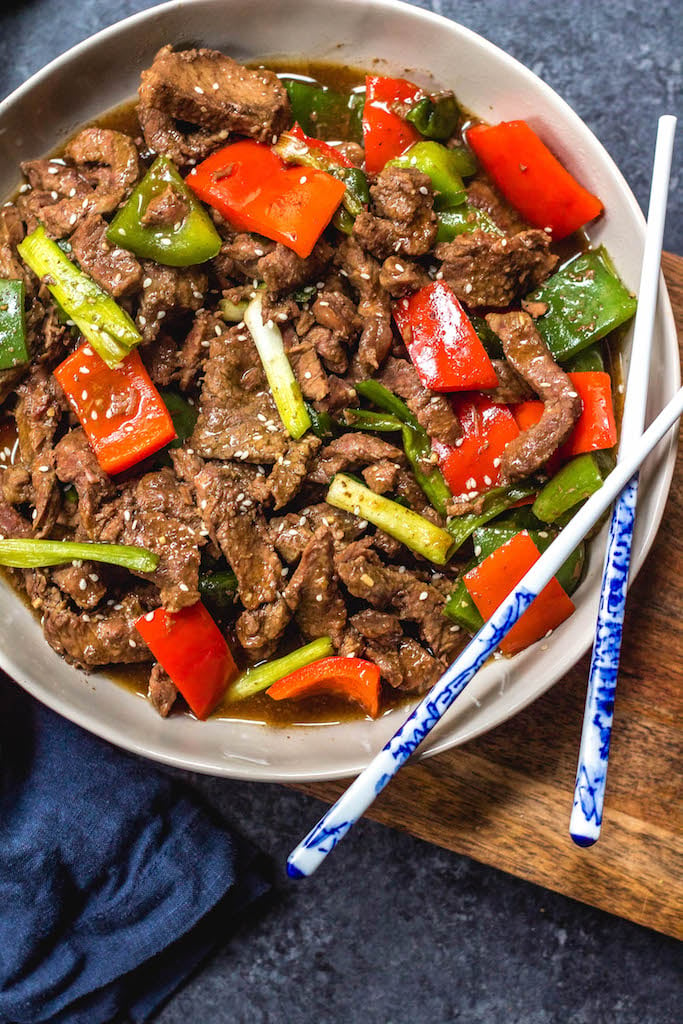 This paleo and Whole30 instant pot pepper beef is a quick and easy weeknight meal that's also keto, gluten free and under 30 minutes. Whole30 instant pot recipes like this pepper beef are also great for meal prepping. It's like a simplified version of a beef stir fry but all contained in the instant pot and with very little hands on time! #whole30instantpot #whole30beefrecipes #paleoinstantpot #ketoinstantpot #ketobeefrecipes