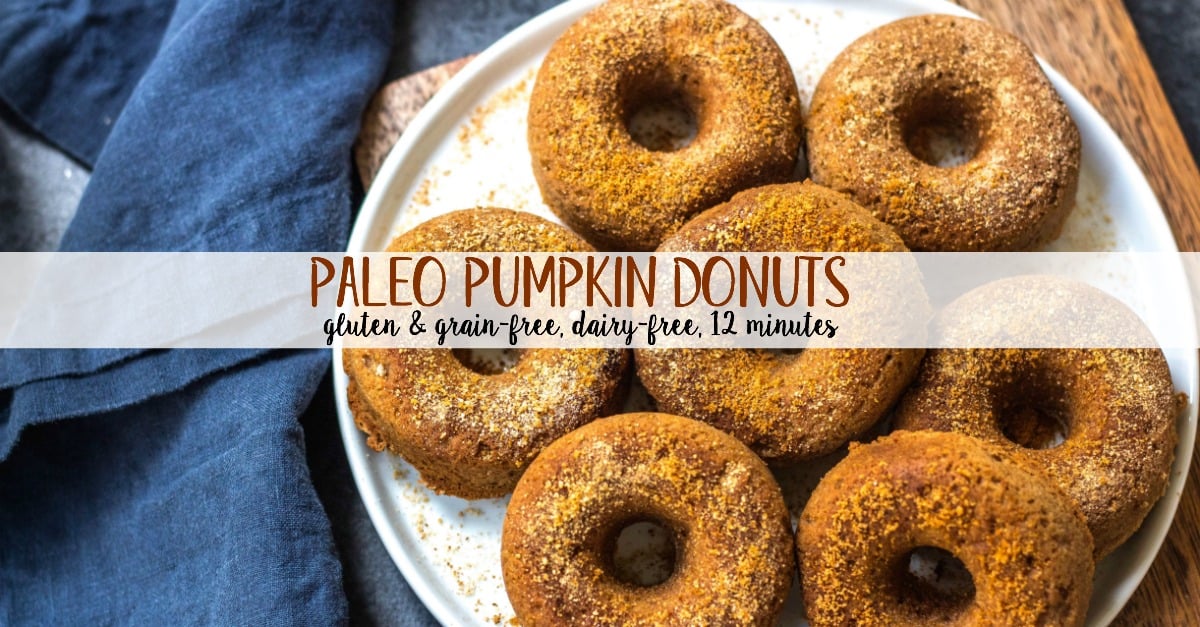 This easy homemade paleo pumpkin donut recipe makes 12 perfect, gluten free and grain free pumpkin spiced donuts. They're the best paleo fall treat that only take a few simple pantry ingredients and a few minutes in the oven. Using real pumpkin, and no refined sugar, these are a much healthier alternative to store-bought pumpkin donuts, and one that the whole family will love! #paleopumpkindonuts #paleodonuts #paleopumpkinrecipes #grainfreedonuts #glutenfreepumpkinrecipes