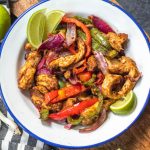 Whole30 air fryer chicken fajitas are perfect for a quick but healthy weeknight meal. These paleo fajitas can be on the table in under 30 minutes and are also gluten-free, keto, and definitely whole family approved. Eat right away or meal prep for the next day but either way they’ll be delicious. #whole30airfryer #paleoairfryer #ketoairfryer #chickenairfryer #glutenfreeairfryer #airfryerchicken