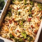 This creamy chicken and bacon alfredo casserole is loaded with veggies from the hash browns and broccoli, and it's paleo, Whole30 compliant, dairy free and gluten free. With only 7 ingredients, it really couldn't be easier to make for a quick weeknight meal or for a simple meal prep recipe. #whole30casserole #whole30chickenrecipes #whole30chickencasserole #paleocasserole #paleochickenrecipes #dairyfreecasserole