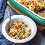 This Whole30 chicken pot pie casserole is the the perfect Whole30 casserole recipe when you're wanting something hearty and comforting. It's a paleo and dairy free twist on the classic pot pie flavors you know and love with a grain free crust, and is awesome for a weeknight meal or for a paleo meal prep recipe because it reheats so well. This is a great family friendly recipe that is sure to become a staple! #whole30casserole #paleocasserole #whole30chickenpotpie #whole30chickenrecipes #paleochickenrecipes