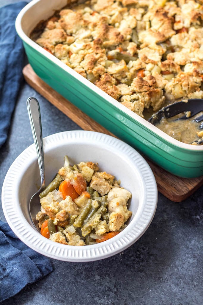 This Whole30 chicken pot pie casserole is the the perfect Whole30 casserole recipe when you're wanting something hearty and comforting. It's a paleo and dairy free twist on the classic pot pie flavors you know and love with a grain free crust, and is awesome for a weeknight meal or for a paleo meal prep recipe because it reheats so well. This is a great family friendly recipe that is sure to become a staple! #whole30casserole #paleocasserole #whole30chickenpotpie #whole30chickenrecipes #paleochickenrecipes