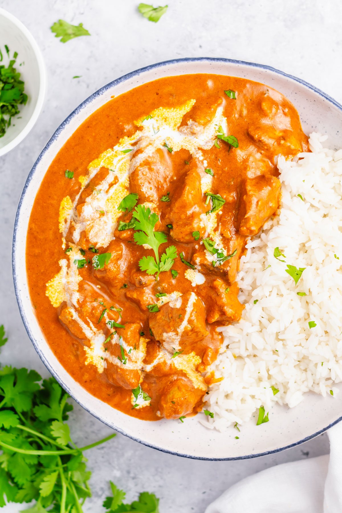 This Whole30 instant pot butter chicken couldn't be easier to make. It's Paleo, gluten-free, keto and takes under 30 minutes from start to finish. This low carb, totally delicious Indian dish is a simple recipe but packs a ton of flavor and only has a cook time of 10 minutes in the pressure cooker. It's a great recipe for meal prep or just for a quick family friendly weeknight meal. #whole30recipes #whole30instantpot #instantpotbutterchicken #whole30chicken #ketoinstantpot