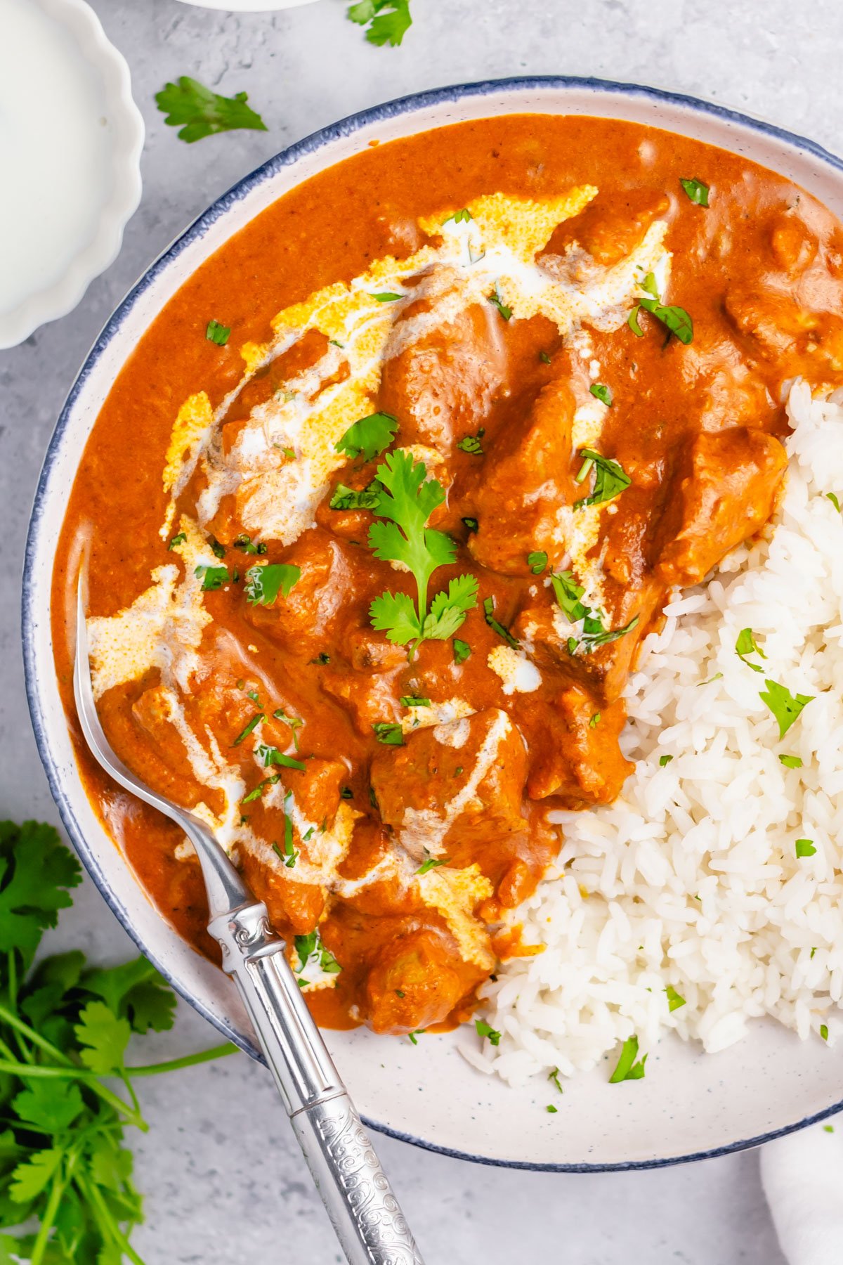 This Whole30 instant pot butter chicken couldn't be easier to make. It's Paleo, gluten-free, keto and takes under 30 minutes from start to finish. This low carb, totally delicious Indian dish is a simple recipe but packs a ton of flavor and only has a cook time of 10 minutes in the pressure cooker. It's a great recipe for meal prep or just for a quick family friendly weeknight meal. #whole30recipes #whole30instantpot #instantpotbutterchicken #whole30chicken #ketoinstantpot