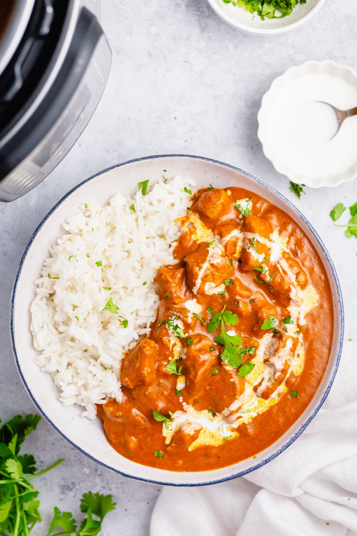 This Whole30 instant pot butter chicken couldn't be easier to make. It's Paleo, gluten-free, keto and takes under 30 minutes from start to finish. This low carb, totally delicious Indian dish is a simple recipe but packs a ton of flavor and only has a cook time of 10 minutes in the pressure cooker. It's a great recipe for meal prep or just for a quick family friendly weeknight meal. #whole30recipes #whole30instantpot #instantpotbutterchicken #whole30chicken #ketoinstantpot