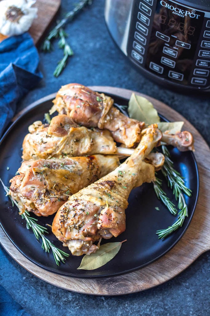 These easy pressure cooker herbed turkey legs are an easy Thanksgiving addition or perfect for just a simple weeknight meal. They’re paleo, Whole30, keto, gluten-free and only take 30 minutes! The herbed butter used helps make the turkey juicy, tender and full of flavor and the gravy is made all in one pot! #whole30pressurecooker #whole30turkey #paleopressurecooker #ketoturkey #turkeylegrecipes #paleothanksgiving