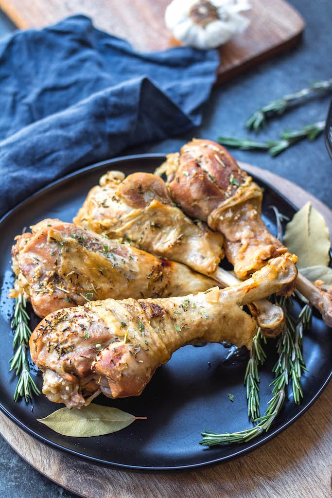 These easy pressure cooker herbed turkey legs are an easy Thanksgiving addition or perfect for just a simple weeknight meal. They’re paleo, Whole30, keto, gluten-free and only take 30 minutes! The herbed butter used helps make the turkey juicy, tender and full of flavor and the gravy is made all in one pot! #whole30pressurecooker #whole30turkey #paleopressurecooker #ketoturkey #turkeylegrecipes #paleothanksgiving