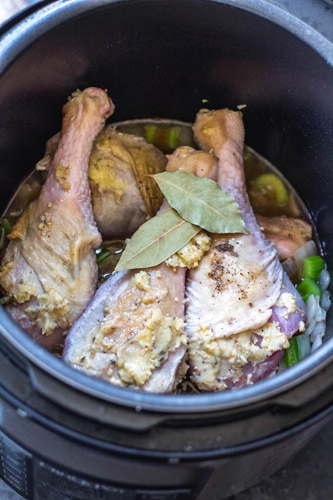 These easy pressure cooker herbed turkey legs are an easy Thanksgiving addition or perfect for just a simple weeknight meal. They’re paleo, Whole30, keto, gluten-free and only take 30 minutes! The herbed butter used helps make the turkey juicy, tender and full of flavor and the gravy is made all in one pot! #whole30pressurecooker #whole30turkey #paleopressurecooker #ketoturkey #turkeylegrecipes #paleothanksgiving