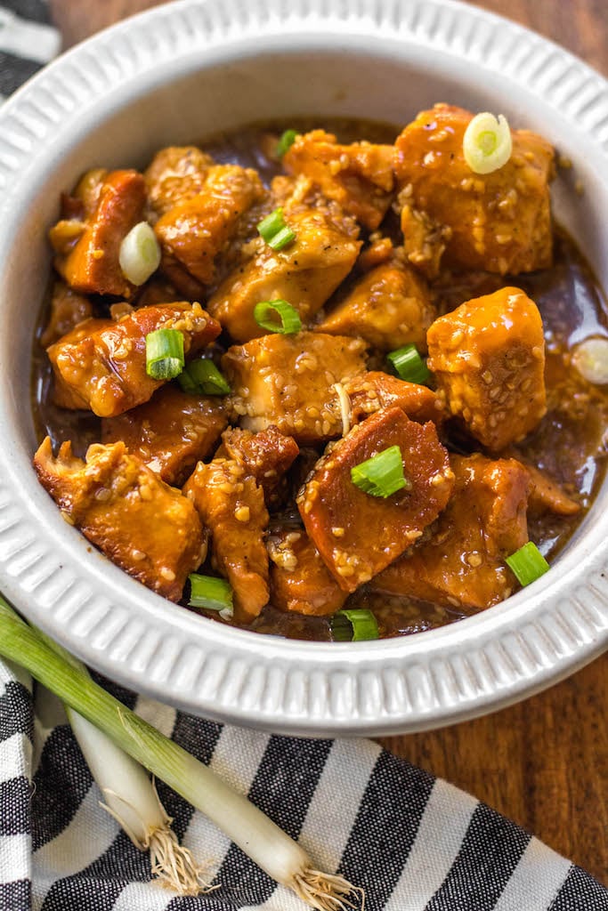 This easy Whole30 slow cooker sesame chicken recipe only calls for a few ingredients and a crock pot, making it an ideal weeknight meal or Whole30 or paleo meal prep recipe. It’s so simple yet has such a great take out fake out flavor for when you’re craving a healthier Chinese food option. #whole30slowcooker #paleoslowcooker #whole30sesamechicken #whole30chickenrecipes #paleochickenrecipes