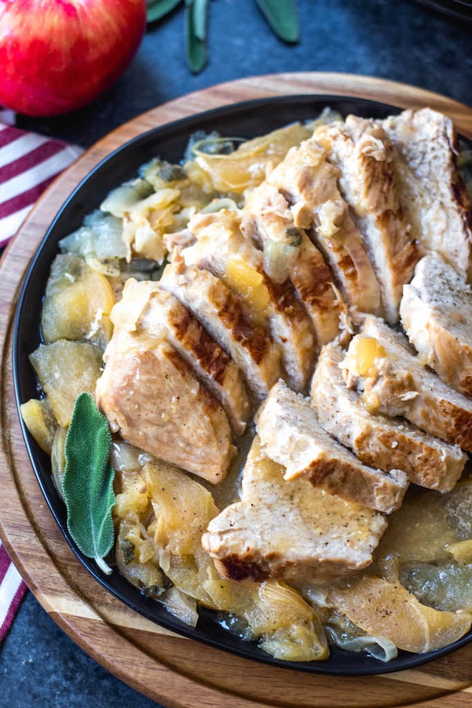 These pressure cooker apple dijon pork tenderloins are a simple fall weeknight meal or great for meal prepping. It's a Paleo, Whole30, gluten-free recipe and made in under 30 minutes. With only a few simple ingredients, this healthy pork tenderloin recipe will be a family favorite that can be on the table in no time #whole30porkrecipes #pressurecookerrecipes #paleoporkrecipes #appledijonporktenderloin #porktenderloin