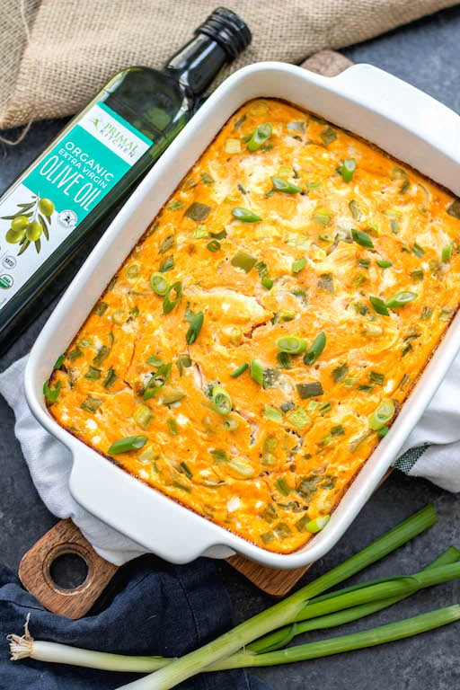 This buffalo chicken egg bake is an easy Whole30, Paleo and Keto breakfast that is quick to prepare, great as leftovers and even freezes well. It only requires a few simple ingredients which makes it a great meal prep recipe. This Whole30 breakfast casserole is also dairy-free, gluten-free and easy to sneak veggies into. #whole30eggbake #whole30breakfast #ketoeggbake #paleoeggbake #buffalochicken