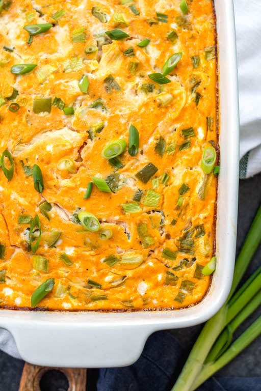 This buffalo chicken egg bake is an easy Whole30, Paleo and Keto breakfast that is quick to prepare, great as leftovers and even freezes well. It only requires a few simple ingredients which makes it a great meal prep recipe. This Whole30 breakfast casserole is also dairy-free, gluten-free and easy to sneak veggies into. #whole30eggbake #whole30breakfast #ketoeggbake #paleoeggbake #buffalochicken