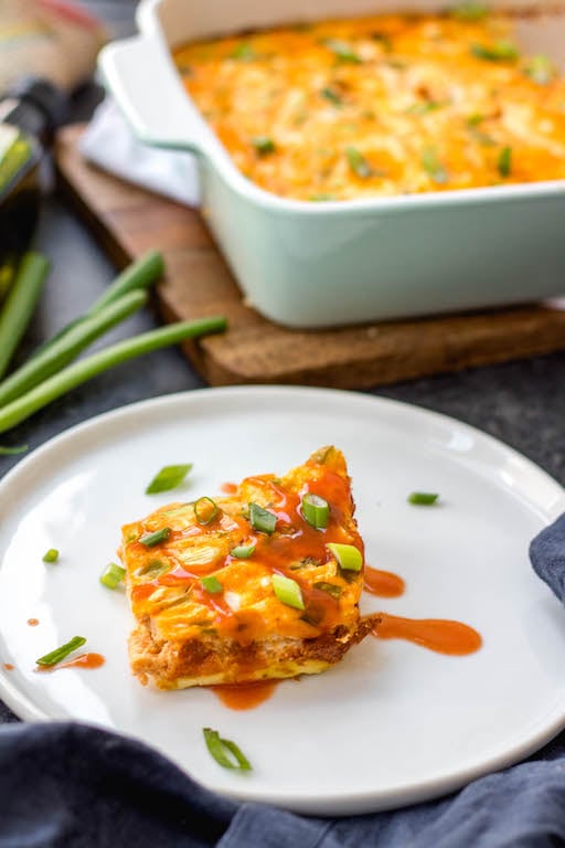 This buffalo chicken egg bake is an easy Whole30, Paleo and Keto breakfast that is quick to prepare, great as leftovers and even freezes well. It only requires a few simple ingredients which makes it a great meal prep recipe. This Whole30 breakfast casserole is also dairy-free, gluten-free and easy to sneak veggies into. #whole30eggbake #whole30breakfast #ketoeggbake #paleoeggbake #buffalochicken