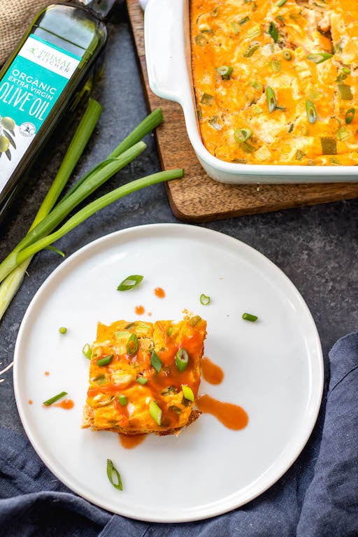 This buffalo chicken egg bake is an easy Whole30, Paleo and Keto breakfast that is quick to prepare, great as leftovers and even freezes well. It only requires a few simple ingredients which makes it a great meal prep recipe. This Whole30 breakfast casserole is also dairy-free, gluten-free and easy to sneak veggies into. #whole30eggbake #whole30breakfast #ketoeggbake #paleoeggbake #buffalochicken