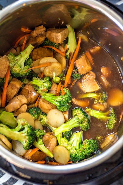 This Paleo and Whole30 instant pot broccoli chicken stir fry is a great weeknight dinner made in one pot and in under 30 minutes. It’s not only a Whole30 instant pot recipe, but it's low carb and gluten-free, so you can enjoy a guilt free Chinese inspired meal or make a healthy meal prep recipe that will ensure delicious leftovers all week. #whole30instantpot #whole30stirfry #paleoinstantpot #whole30chickenrecipes #ketoinstantpot